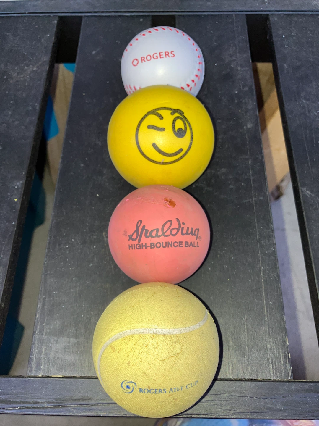 Four assorted balls: Spalding, Rogers