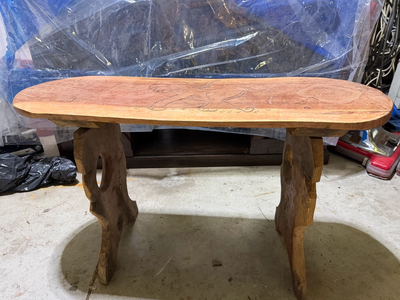 Carved Wooden Bench with Elephant Design