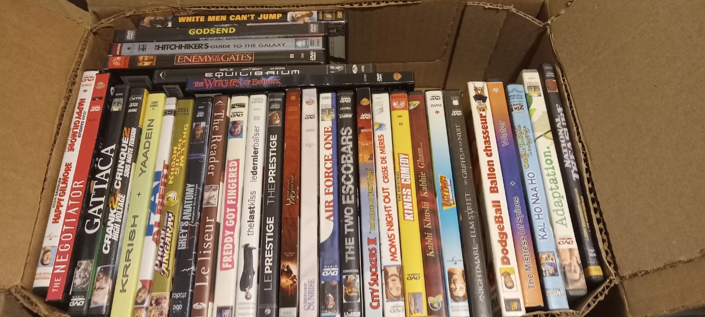1 box of Movie DVDs Bundle