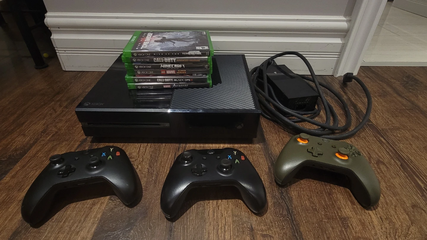 Xbox One Console with 3 Controllers and 7 Games