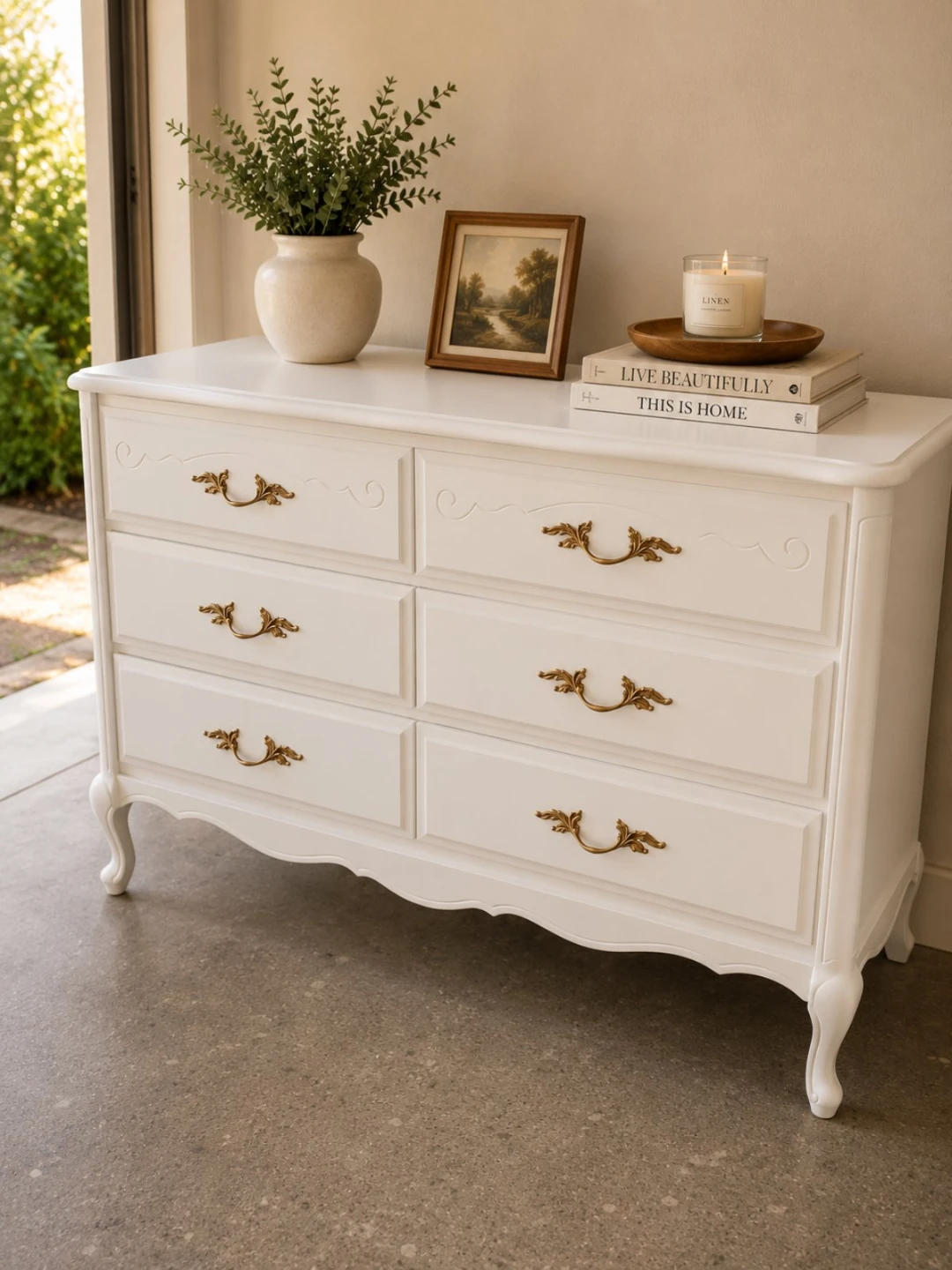 White 6-Drawer Dresser with Ornate Hardware