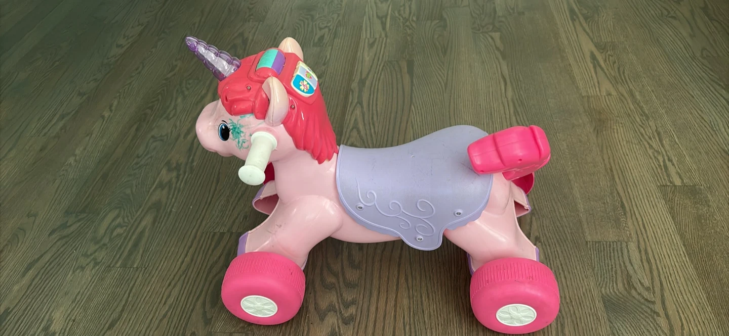 Fisher-Price Pink Unicorn Ride-On Toy