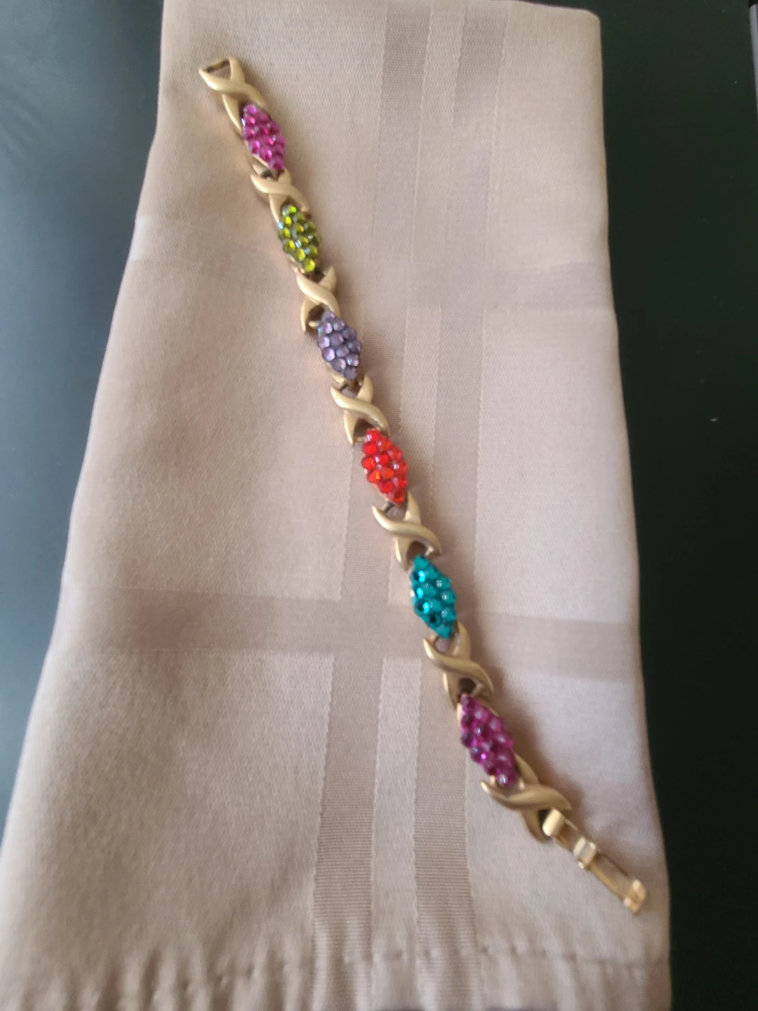 Gold tone XO link bracelet with colourful gems - photo 2
