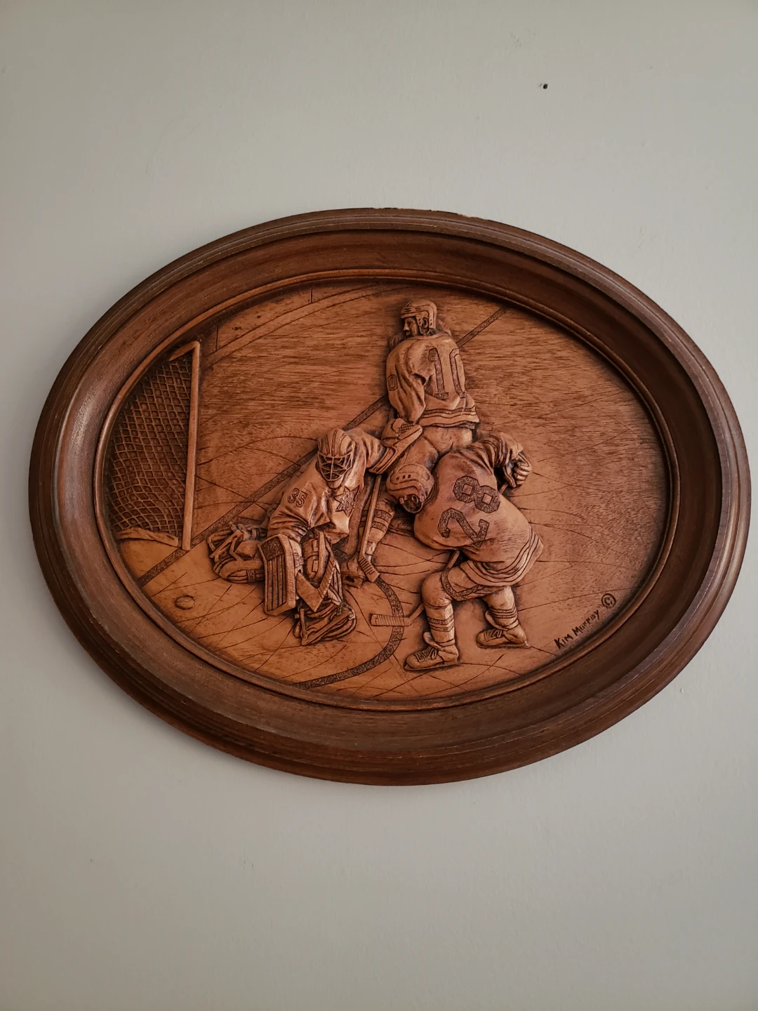 Creative Carvings Inc. "He Scores" Wood Carving by Kim Murray