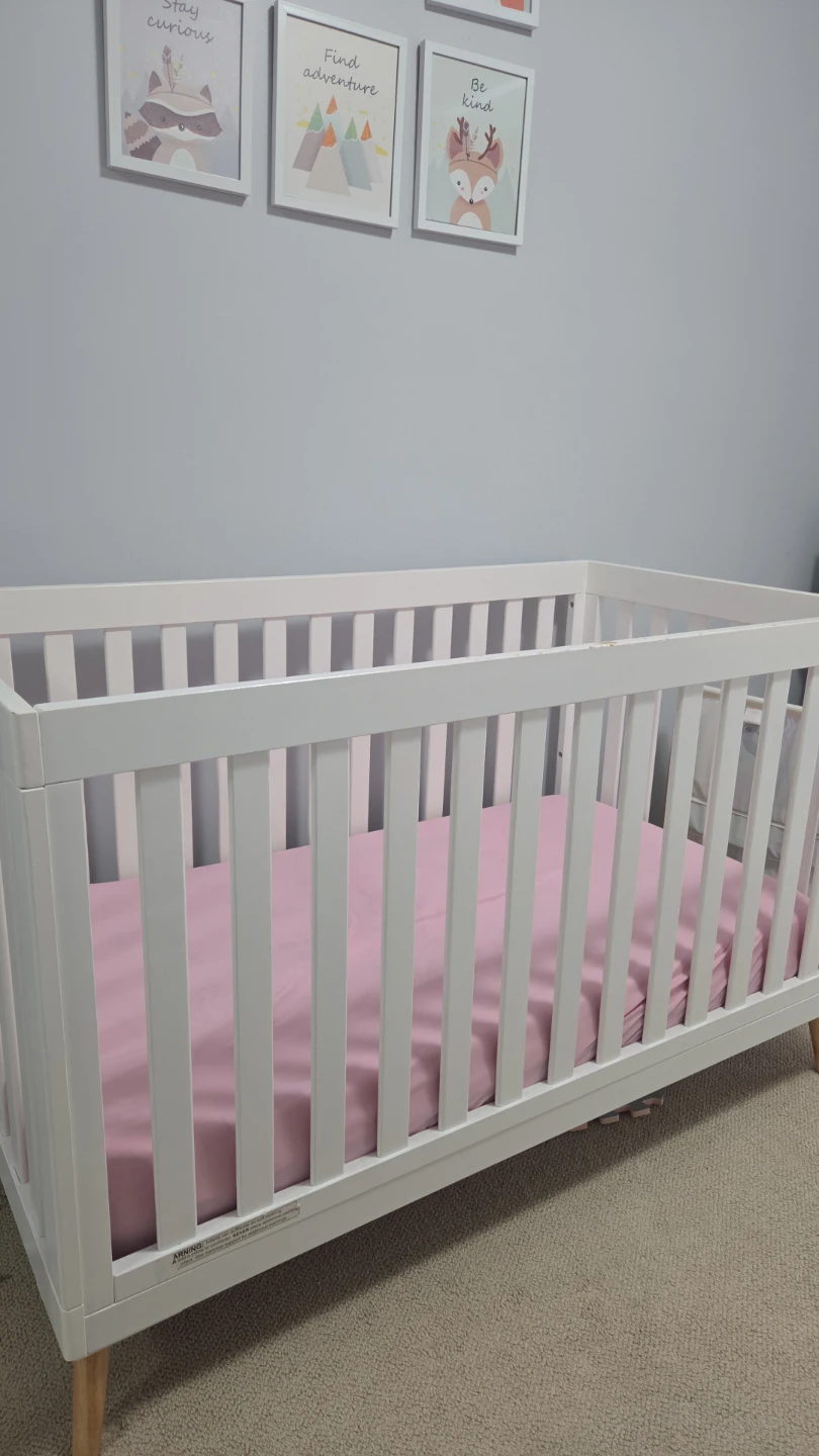 White crib mattress included