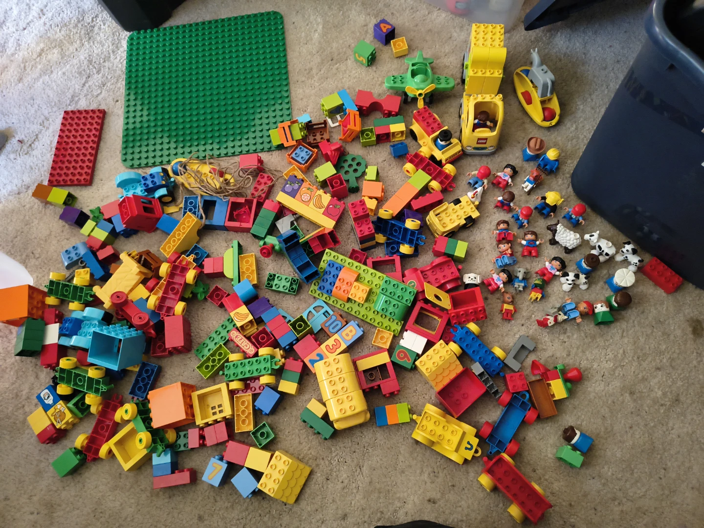 Assorted LEGO Building Blocks and Train Set Pieces