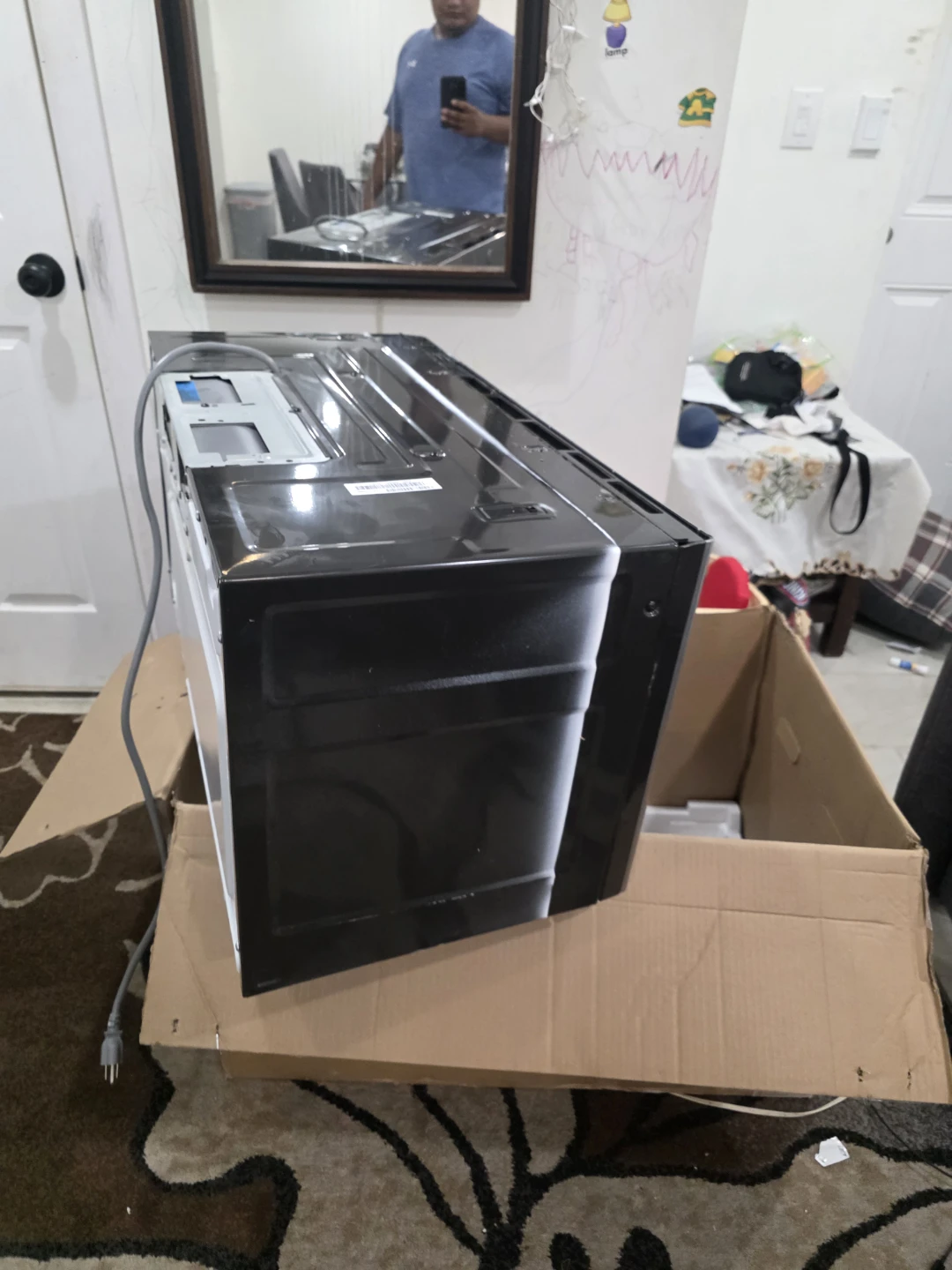 GE Stainless Steel Over-the-Range Microwave - photo 2