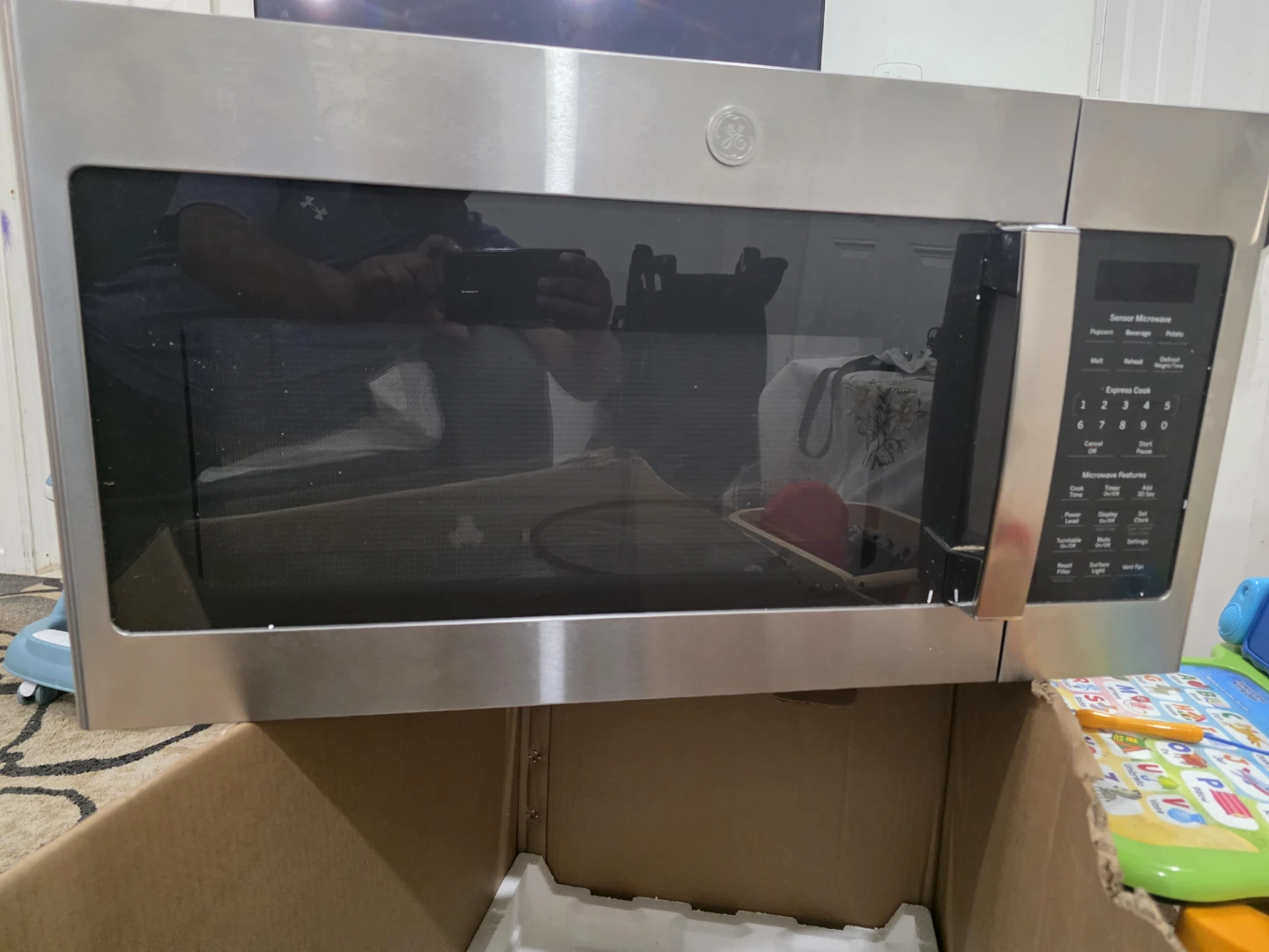 GE Stainless Steel Over-the-Range Microwave - photo 3