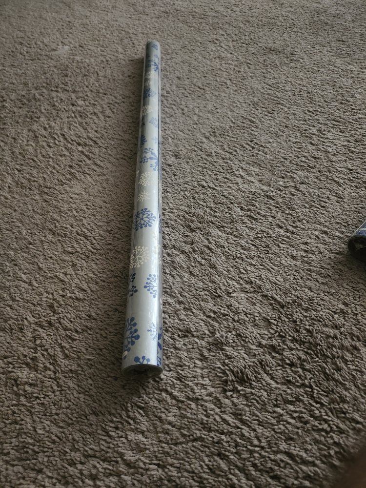 Wrapping Paper Roll with Snowflake Design