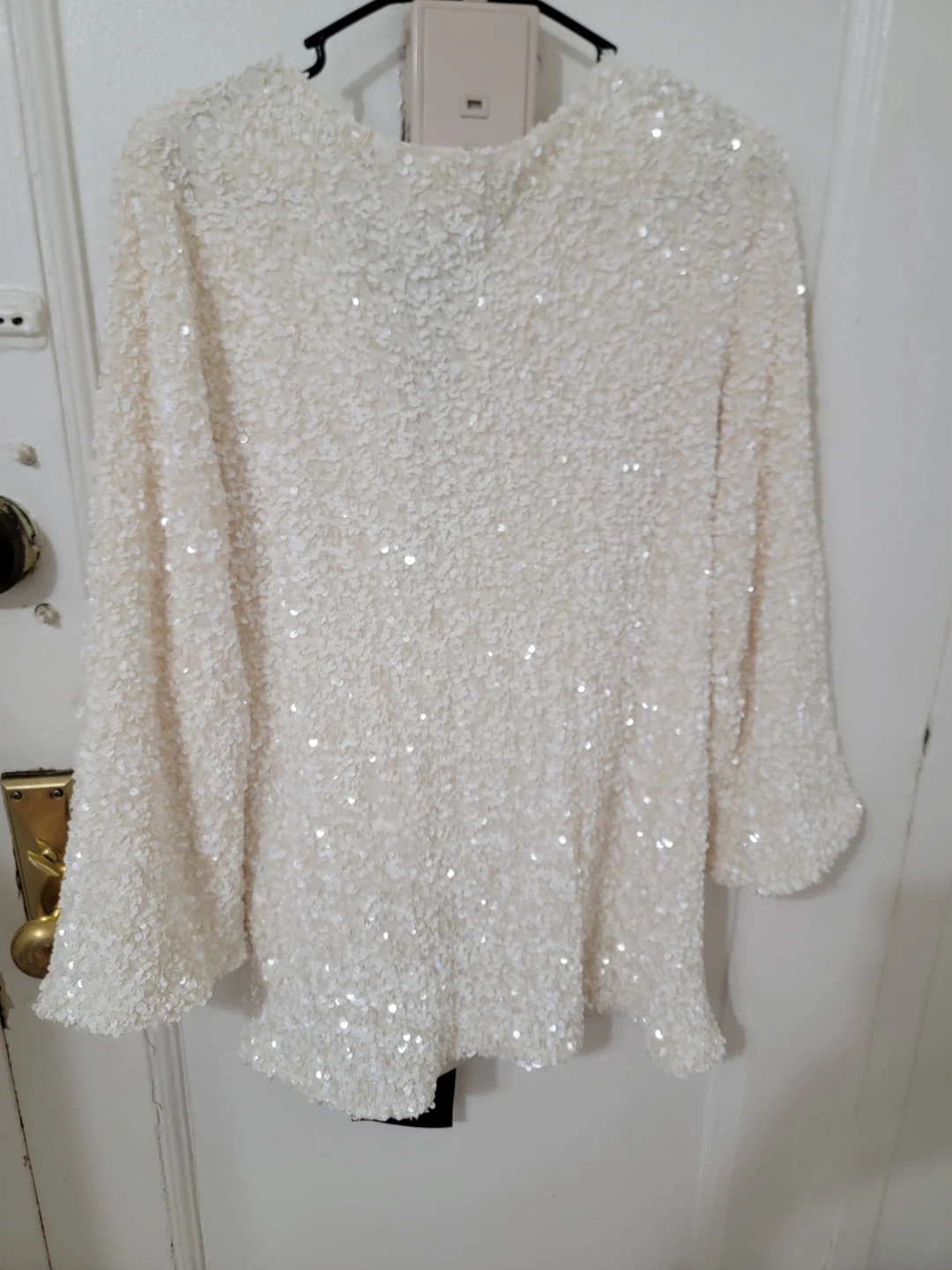 Cream Sequin Top with Black Bow Accent
