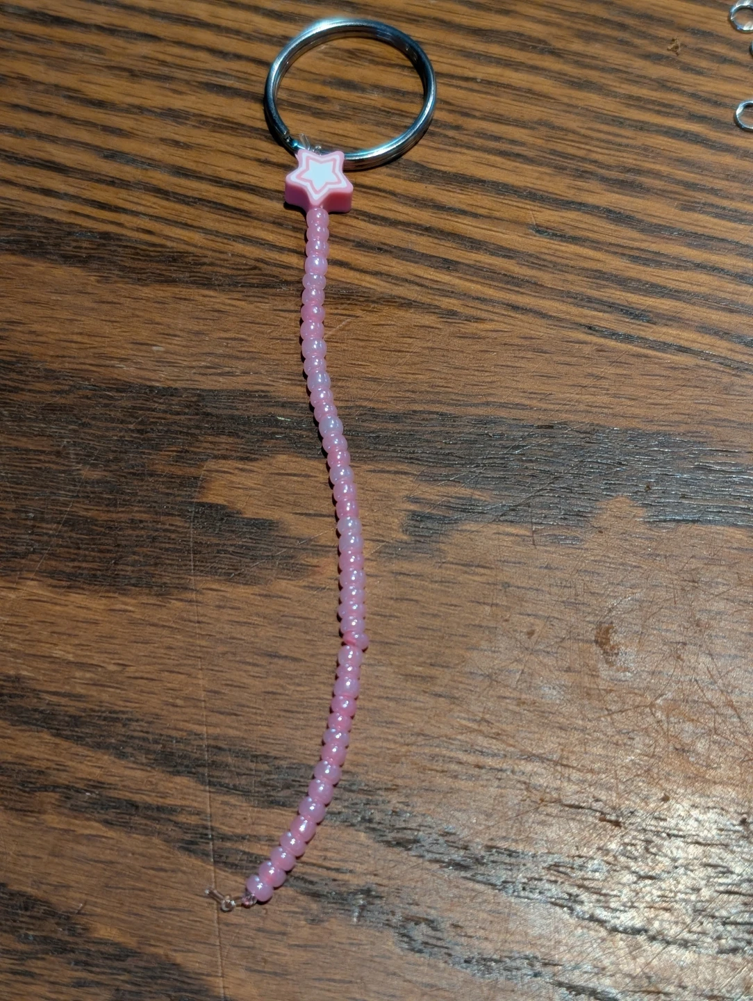Pink beaded keychain with star charm