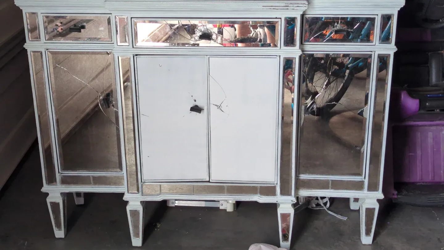 Mirrored Vanity Cabinet with Cracks