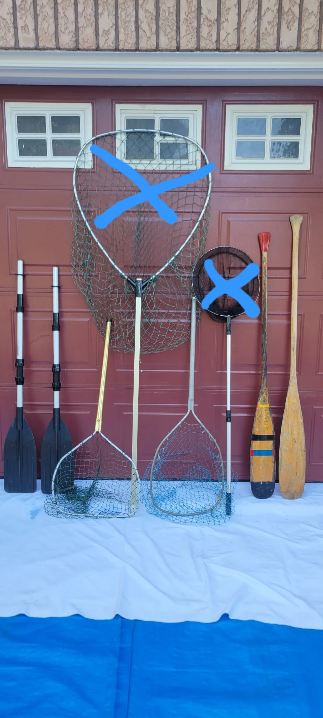 Assorted Fishing Nets and Oars