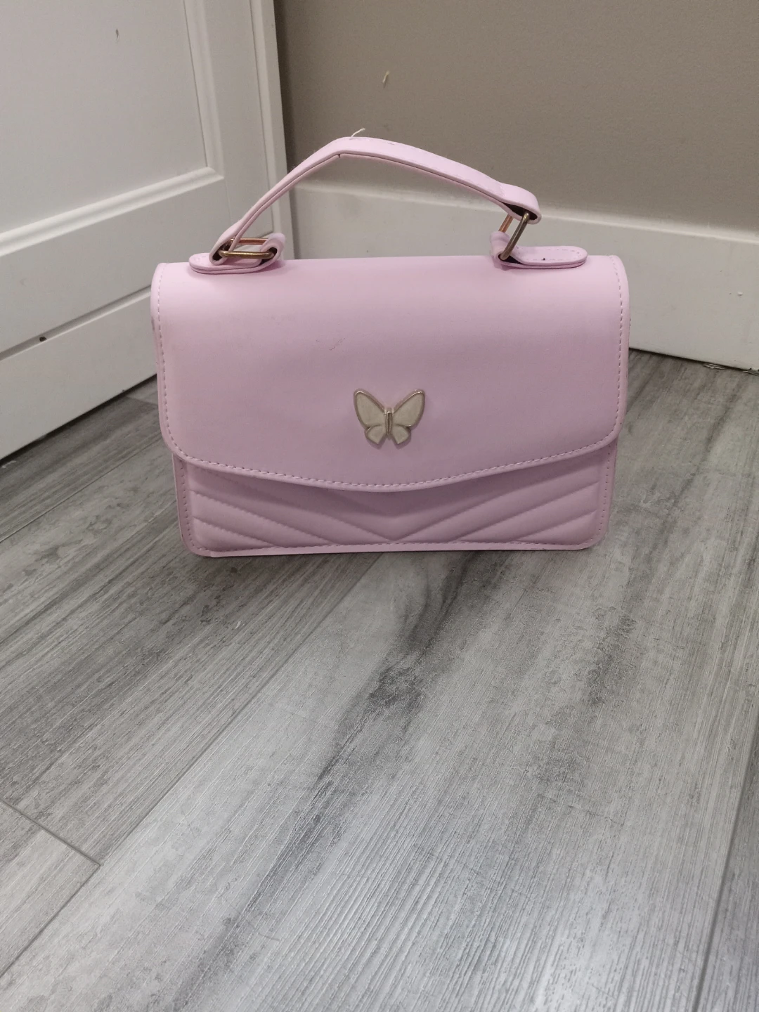Pink purse with butterfly detail - photo 2