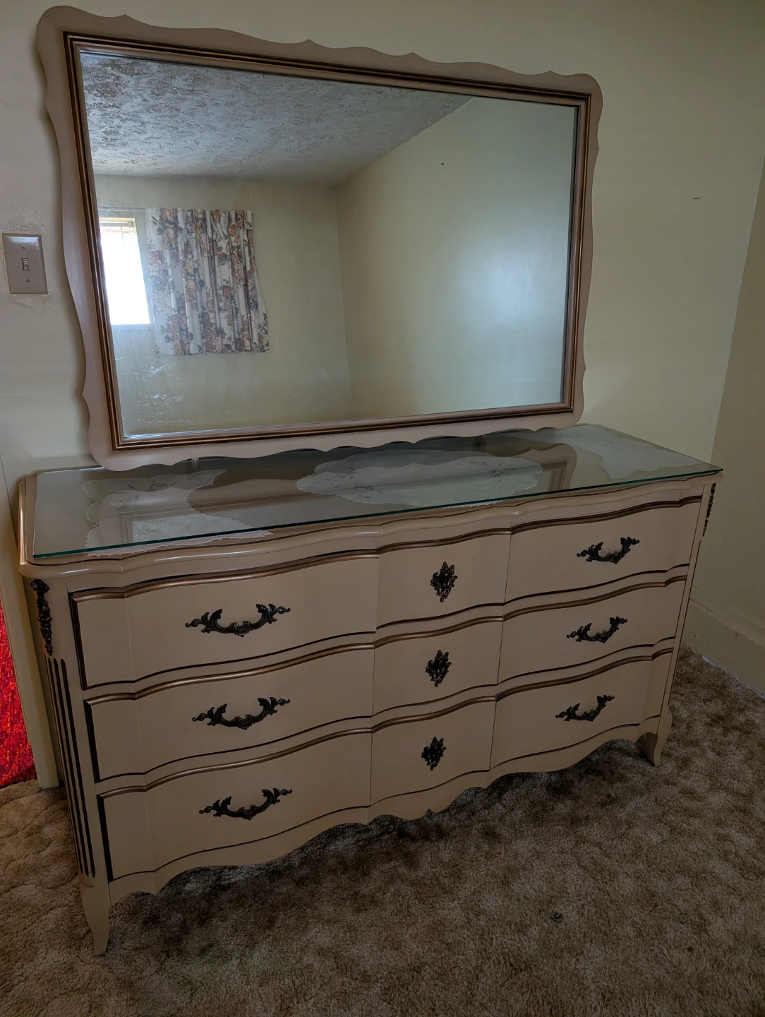 Antique wood dresser with glass protection on top