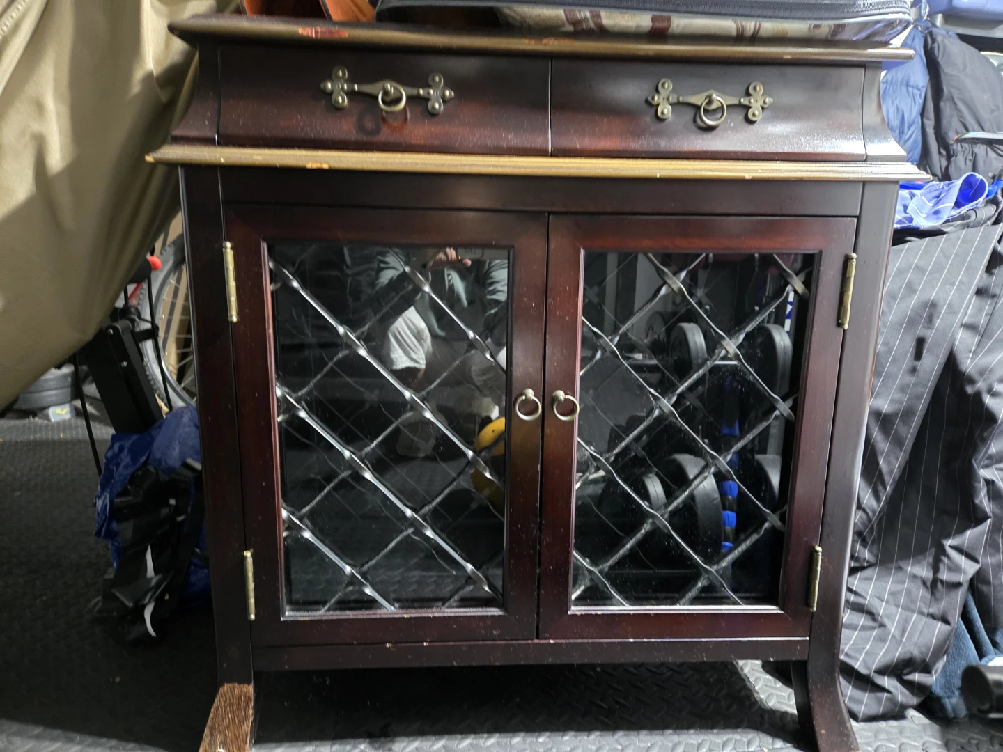 Bombay & Co. Wooden wine cabinet with glass doors