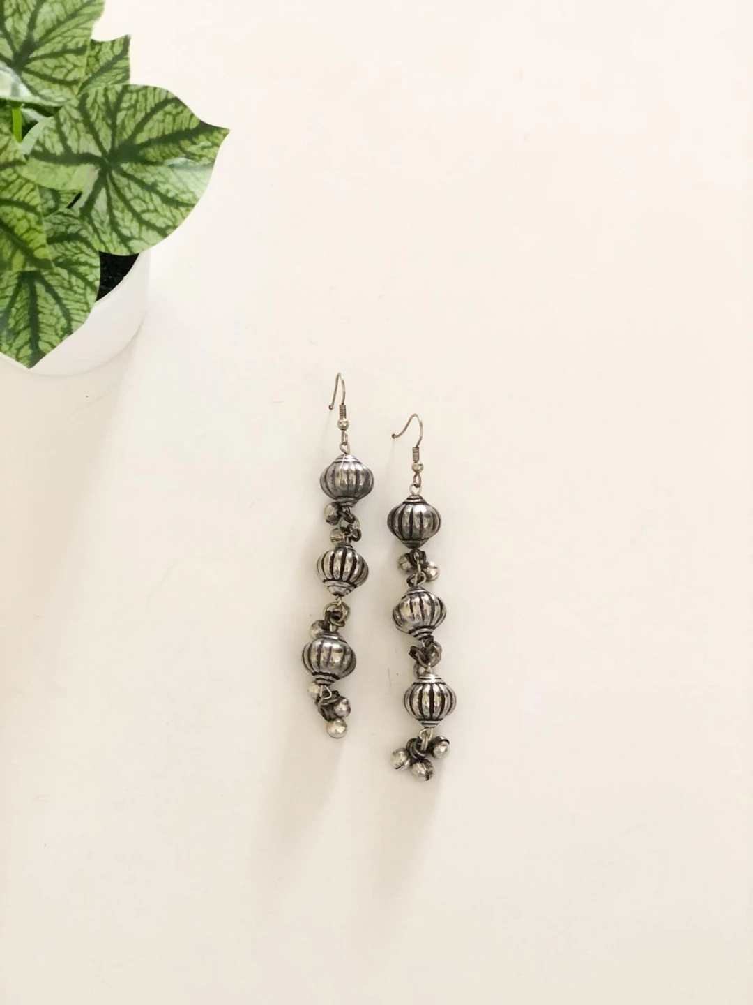 Silver Tone Dangle Earrings with Beaded Design
