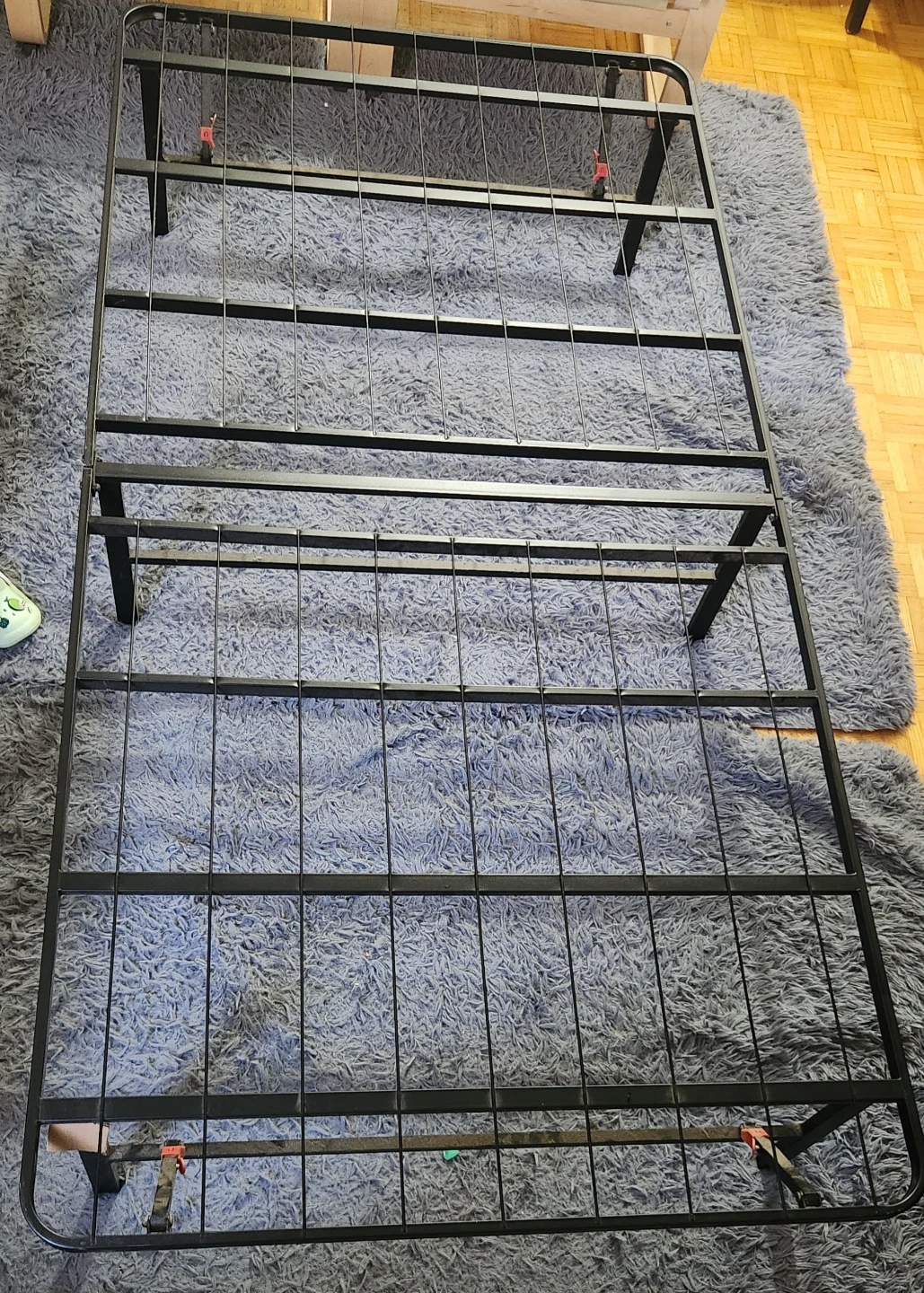Single Metal Bed Frame with mattress.