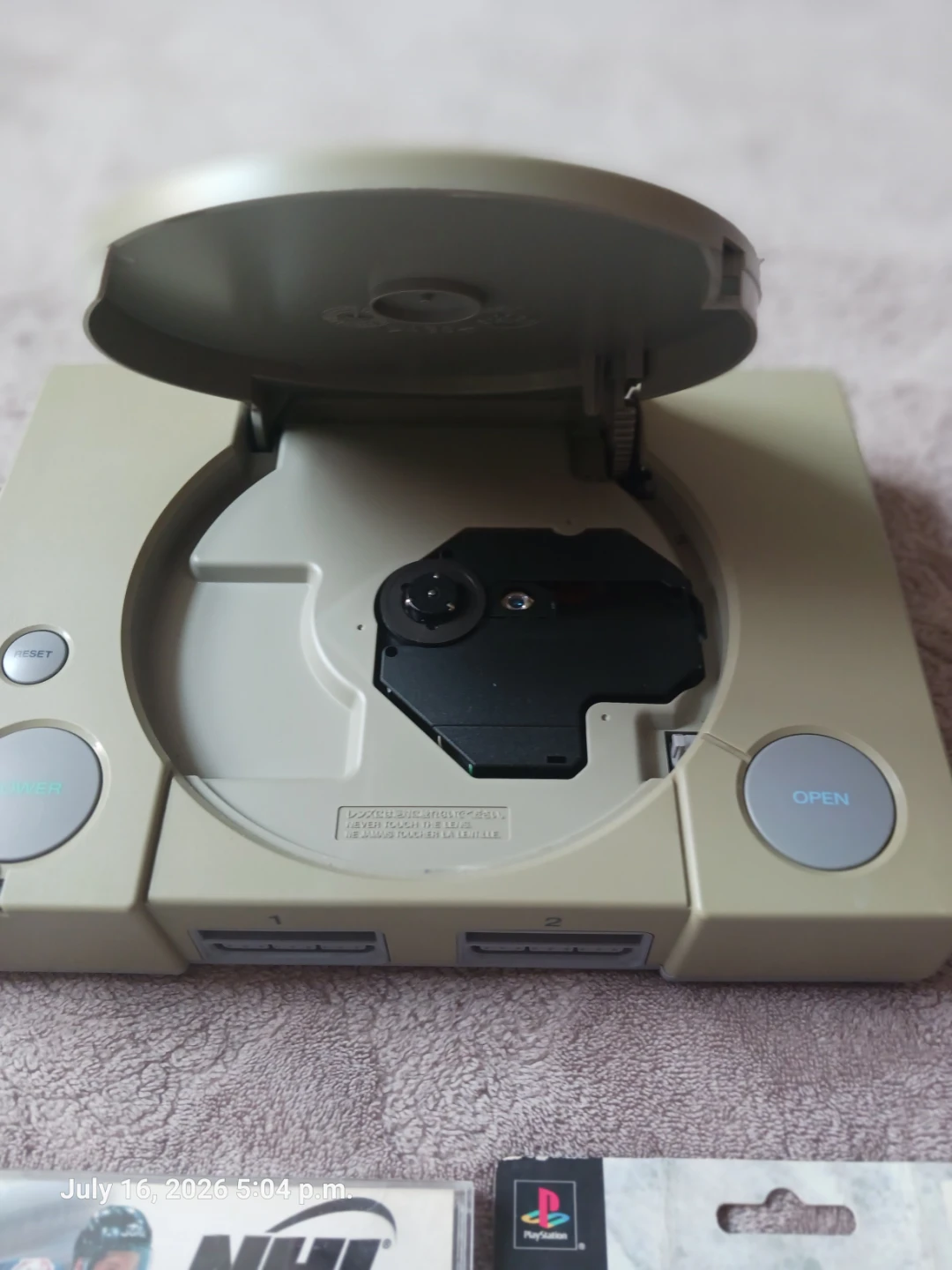 Sony PlayStation 1 Console Bundle with NHL 98 and Controllers - photo 2
