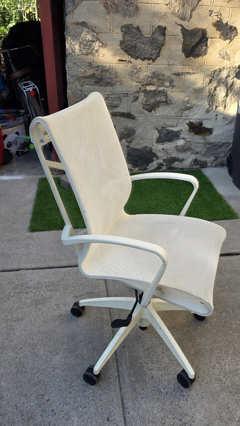 White mesh office chair with wheels