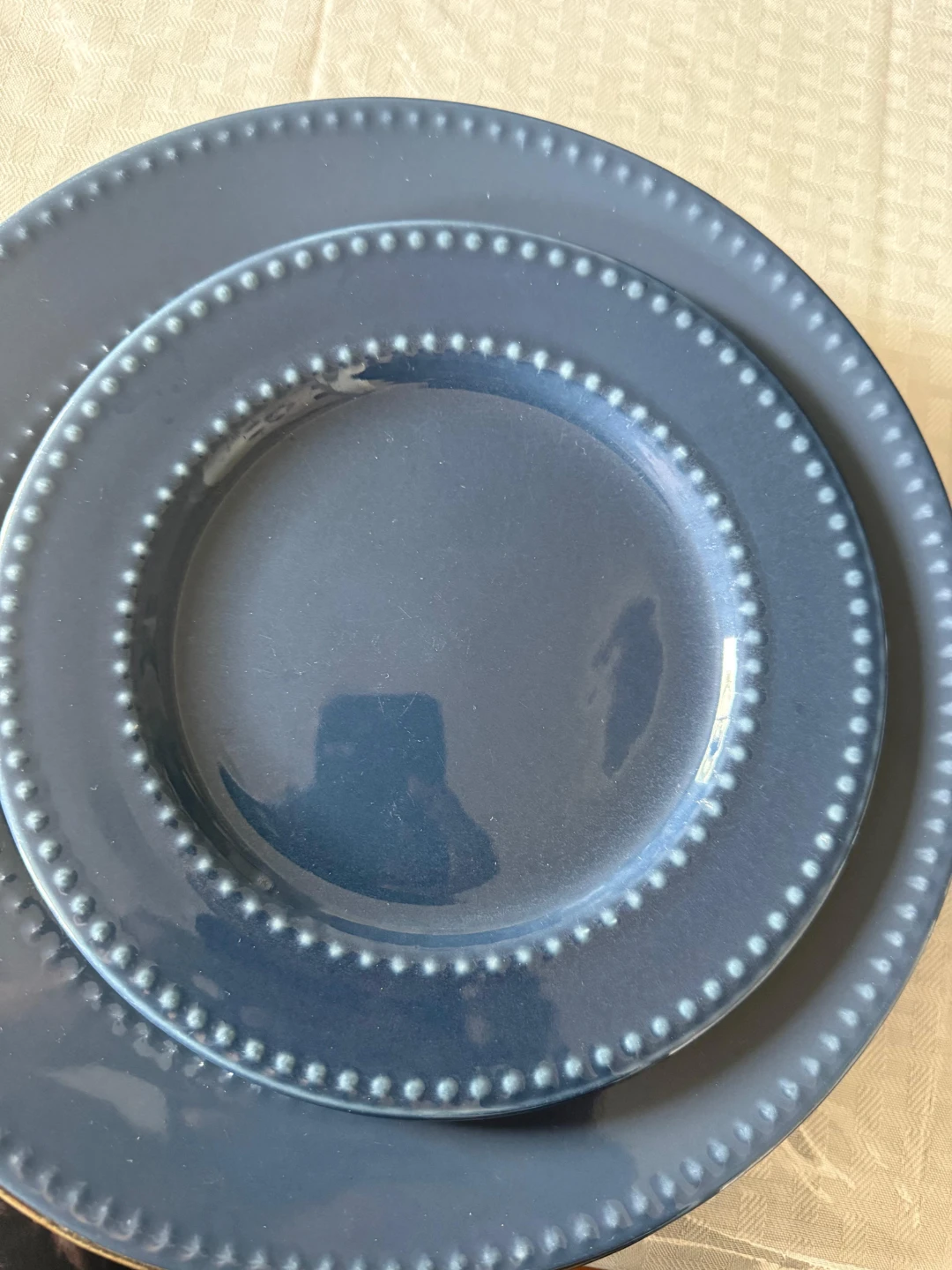 Set of blue beaded plates