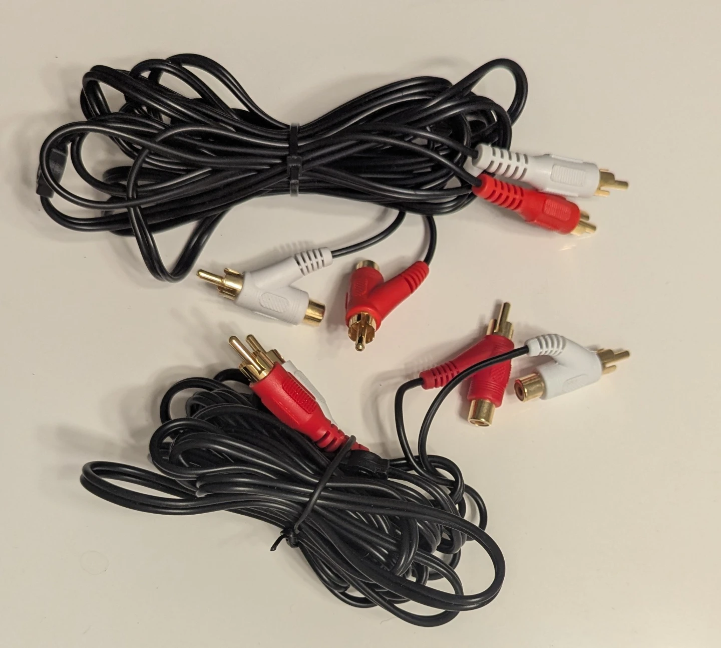 A pair of RCA Y Audio Splitter Cables