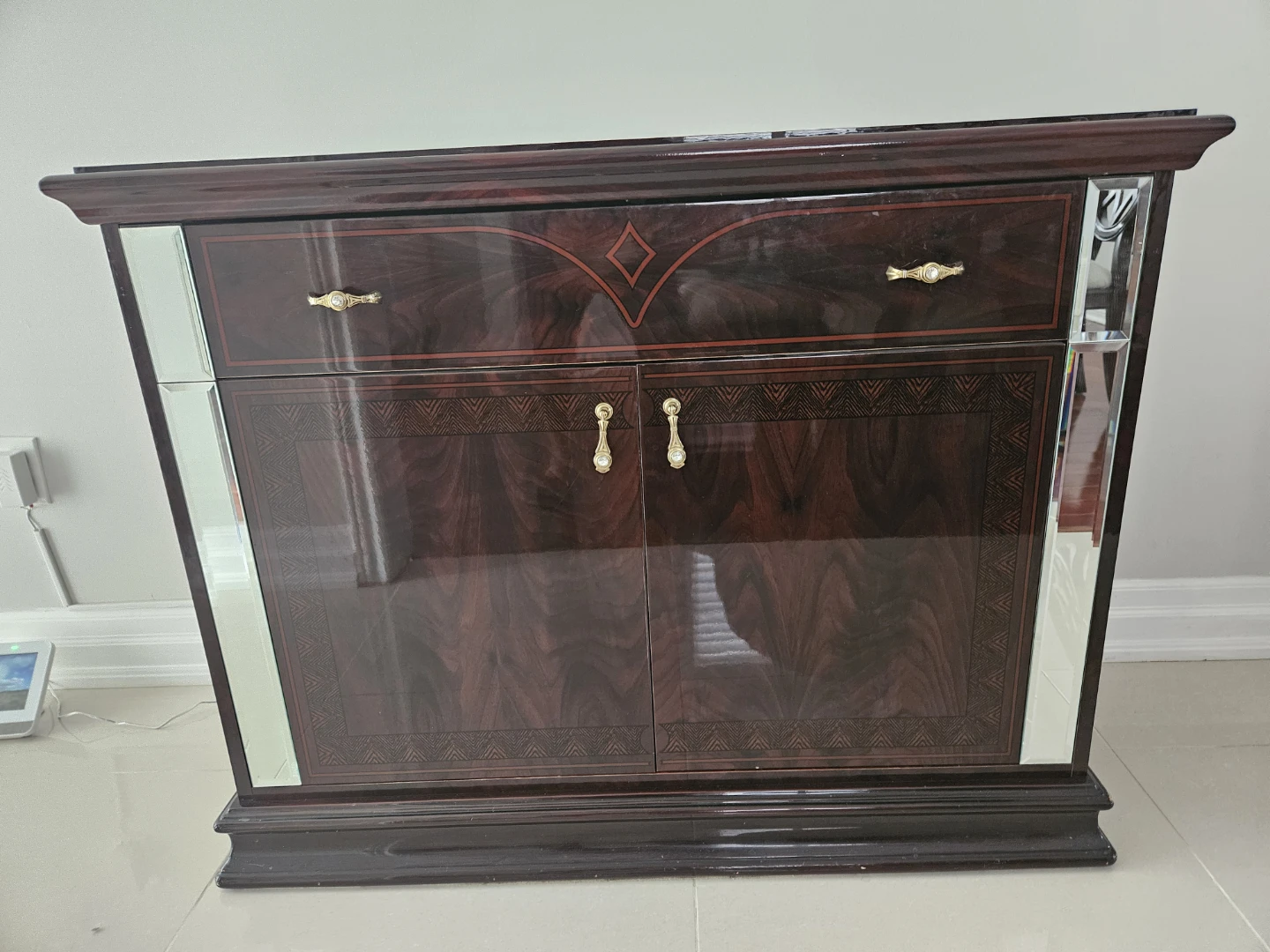 Dark Wood Cabinet with Mirrored Accents