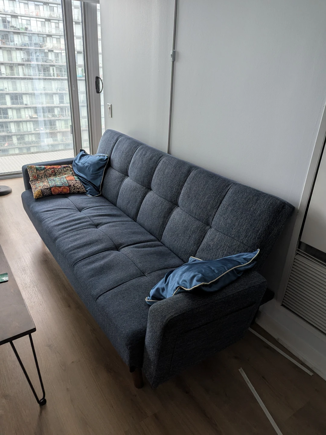 Blue Tufted Sofa bed