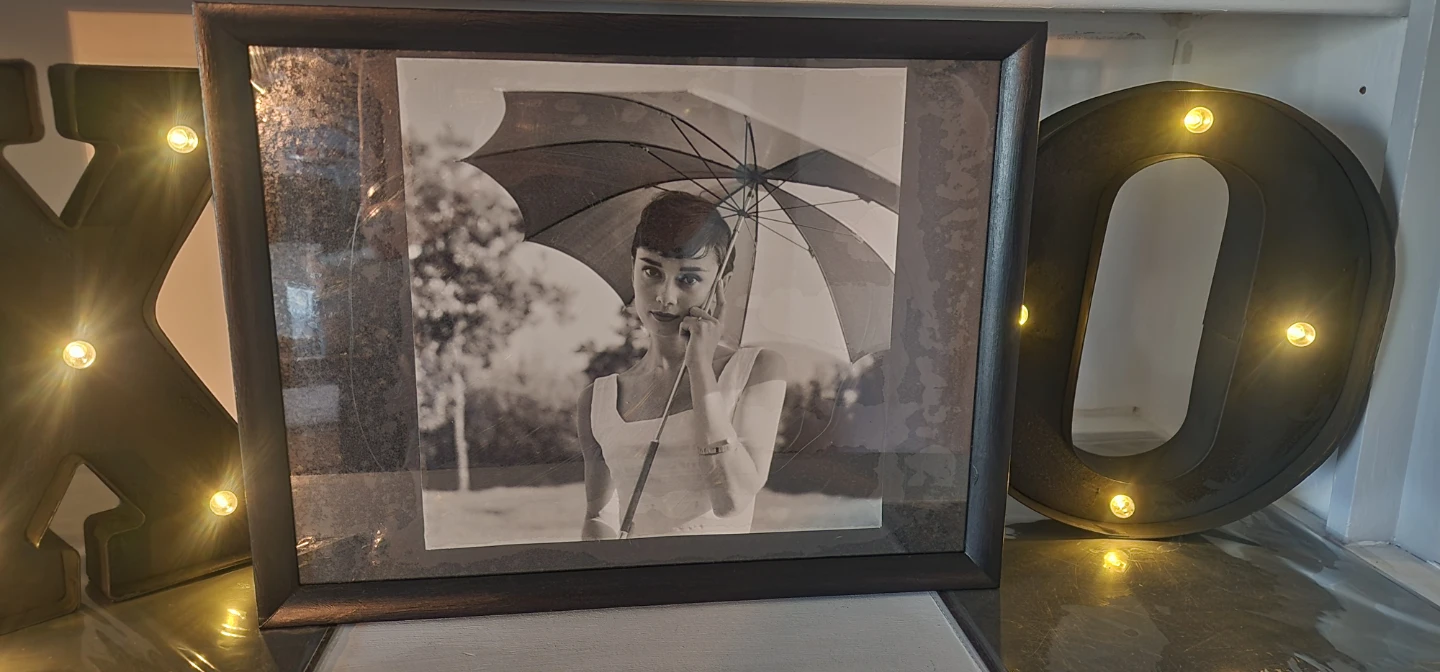 Audrey Hepburn framed photo with umbrella