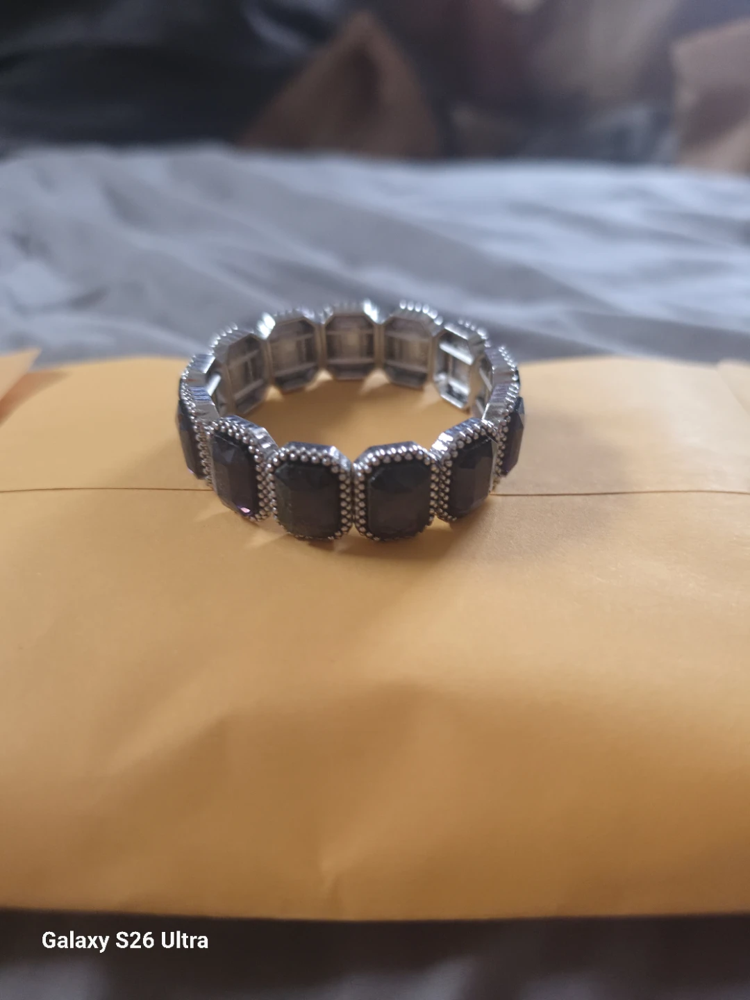 Stretch bracelet with dark stones