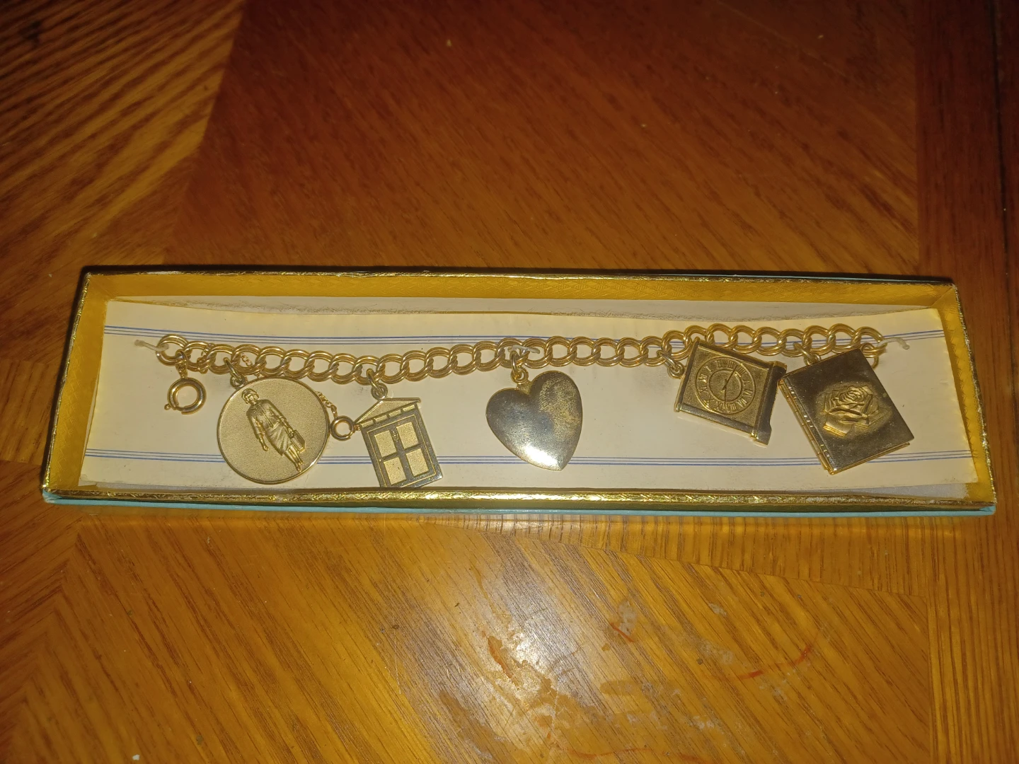 Avon Gold-tone Charm Bracelet 1965 presidents award