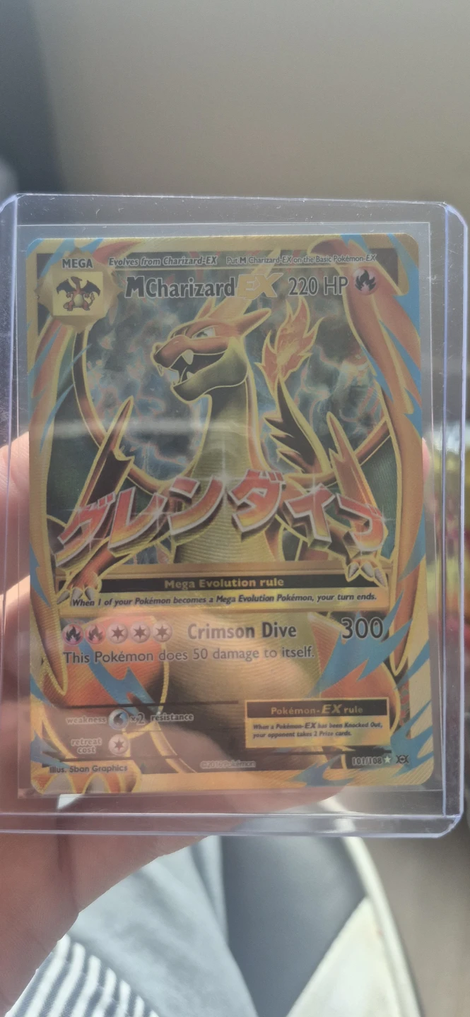 M Charizard EX Pokémon Card