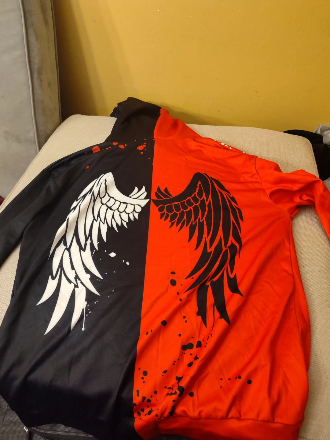 Color Block Hoodie with Wing and Face Graphics