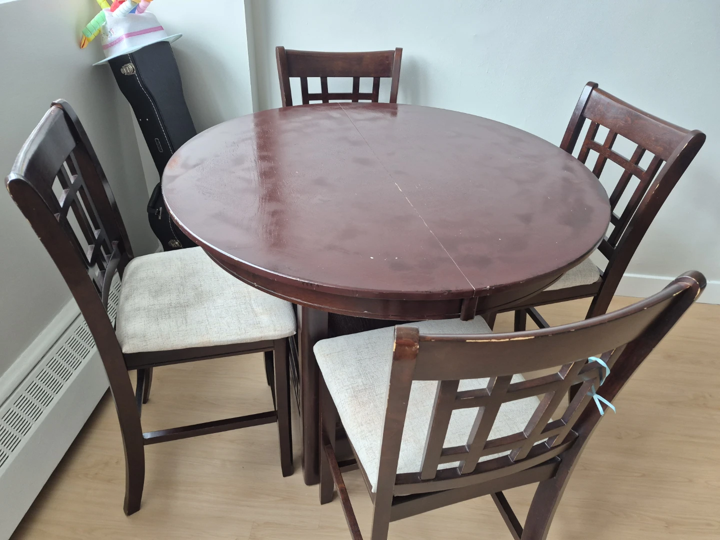 Hello, For sale: dining set with 4 wooden chairs.