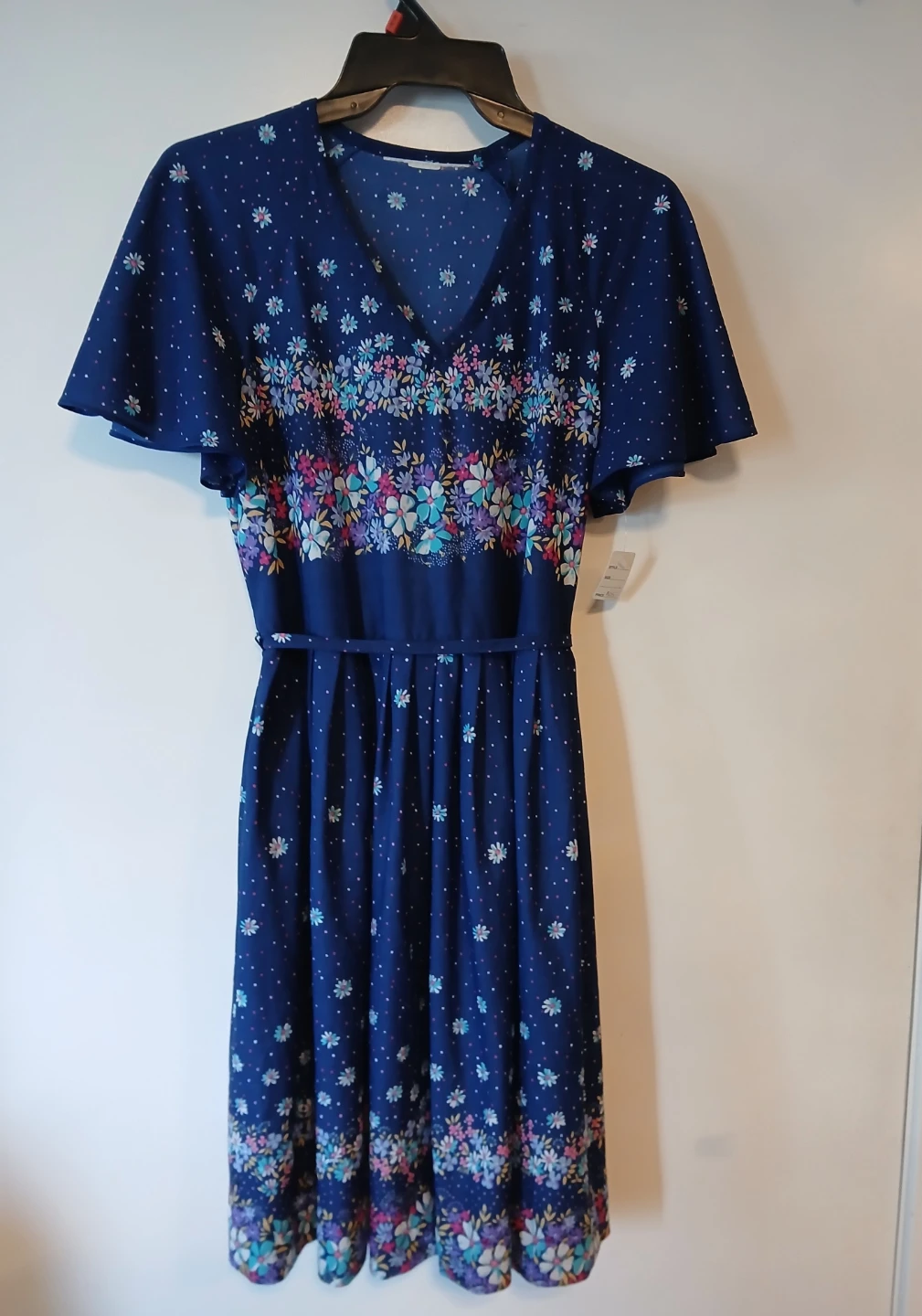 New. Navy Floral Dress with tie back strap. Medium. Location ⬇️