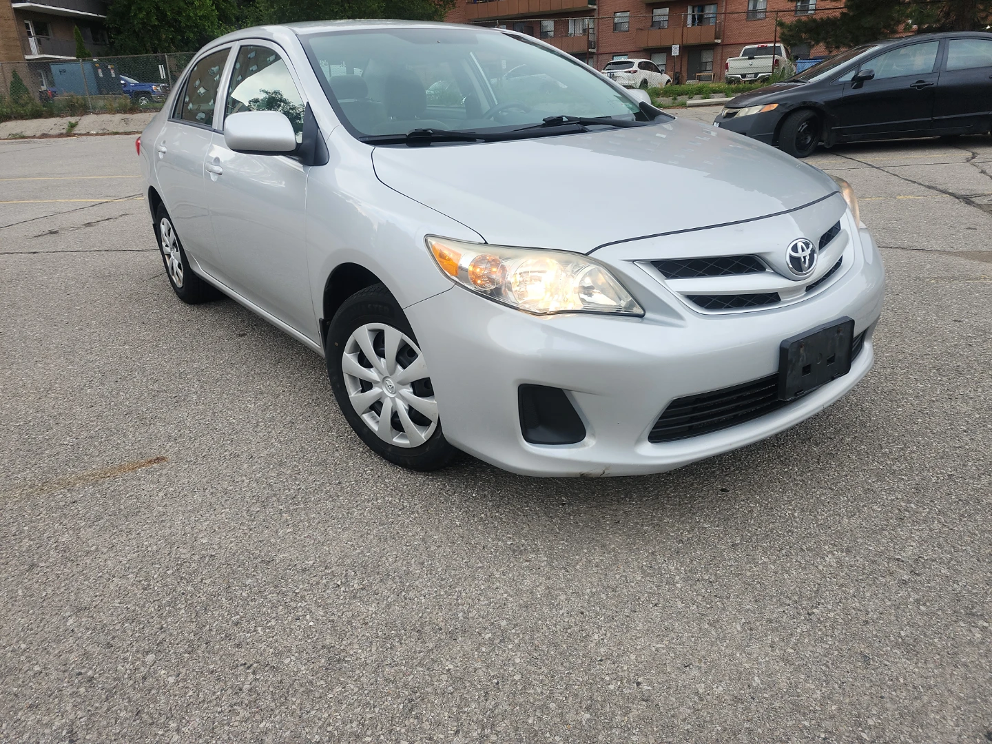 Silver Toyota Corolla certified CLEAN CARFAX ONE OWNER