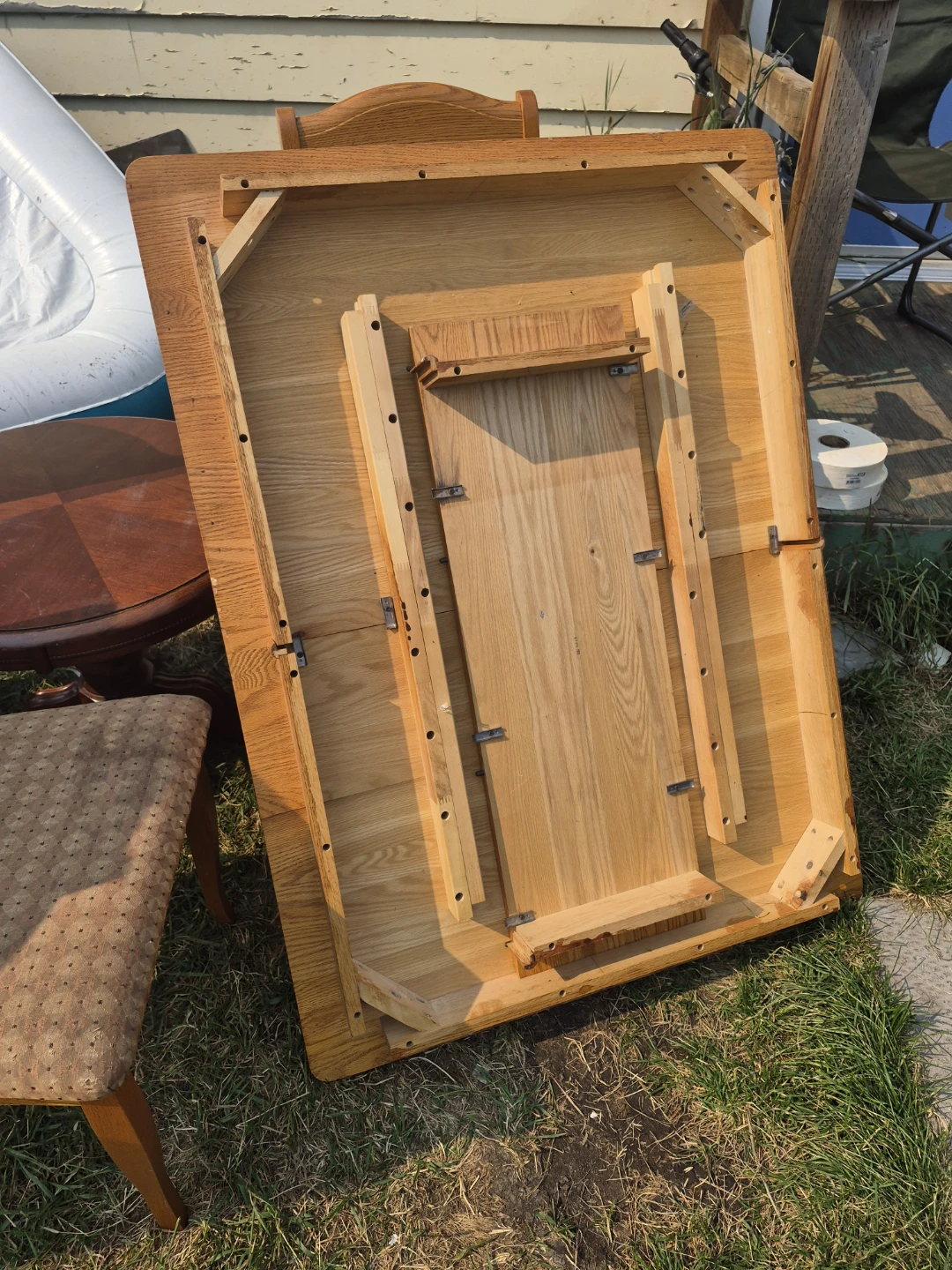 Solid oak table with three chairs