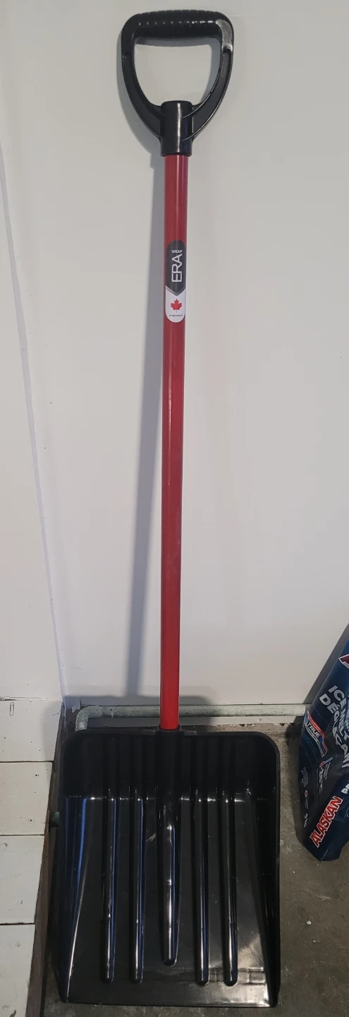 yard waste bag, snow shovel, leaf rake