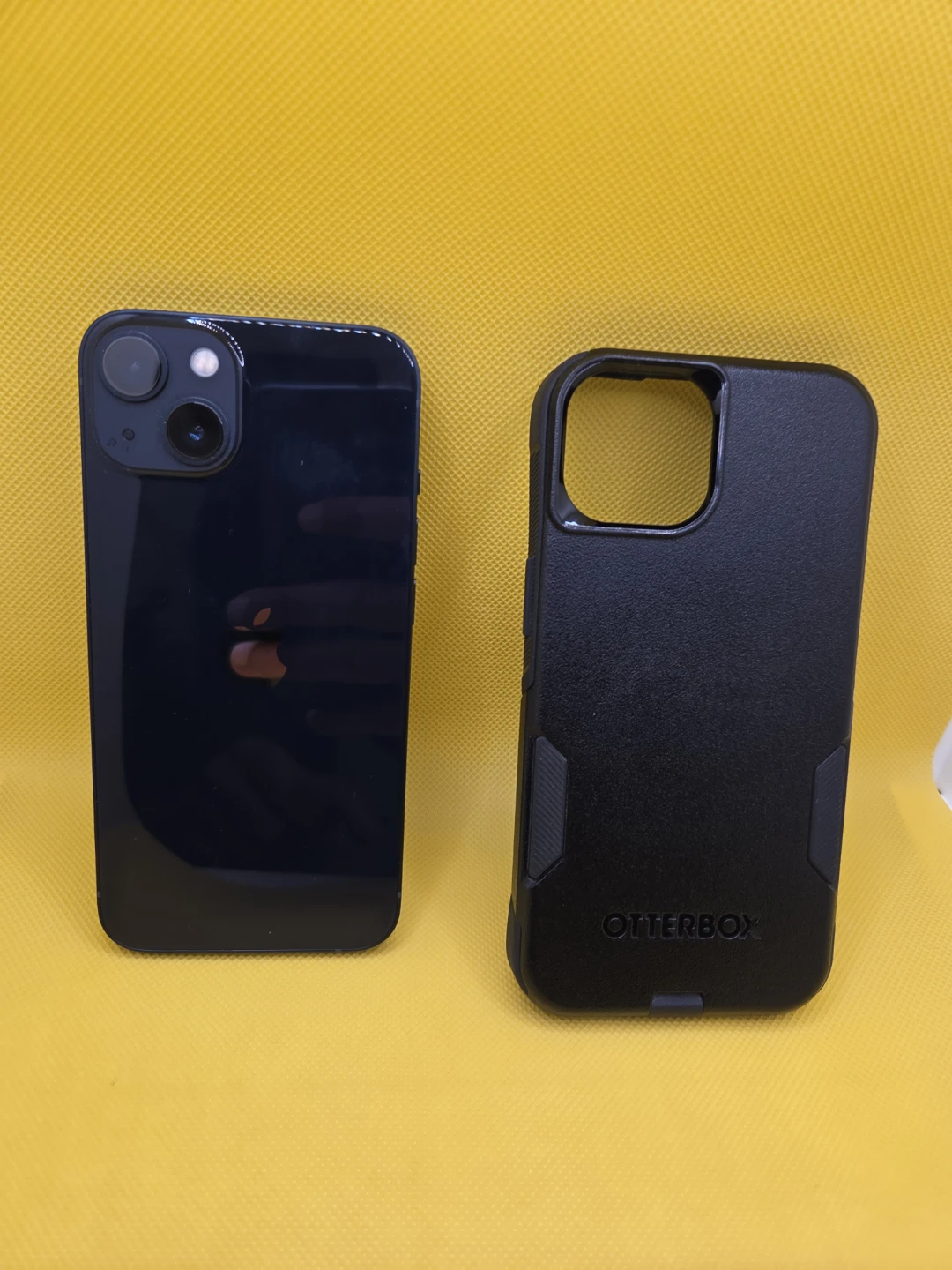 iPhone 13 with Otterbox case and box
