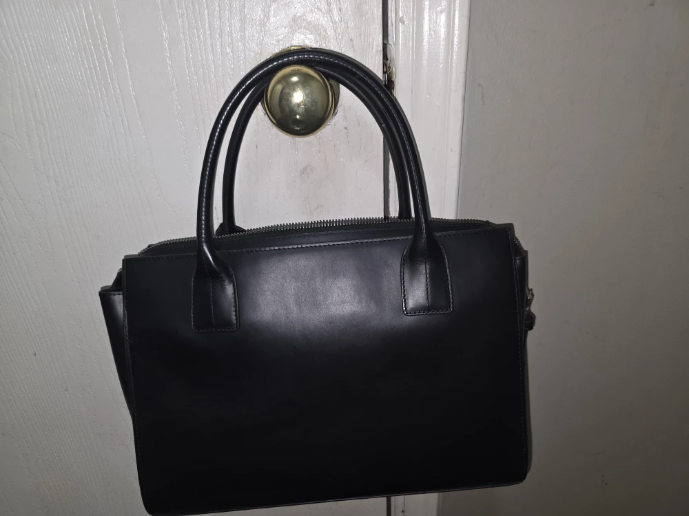 Black BCBGMAXAZRIA Tote Bag with Tassel Detail