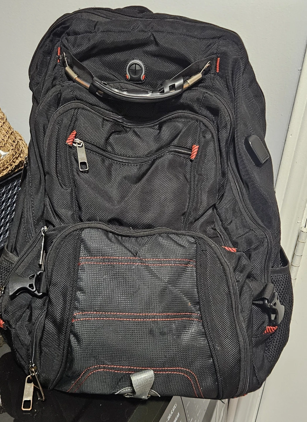 Black Backpack with Red Stitching