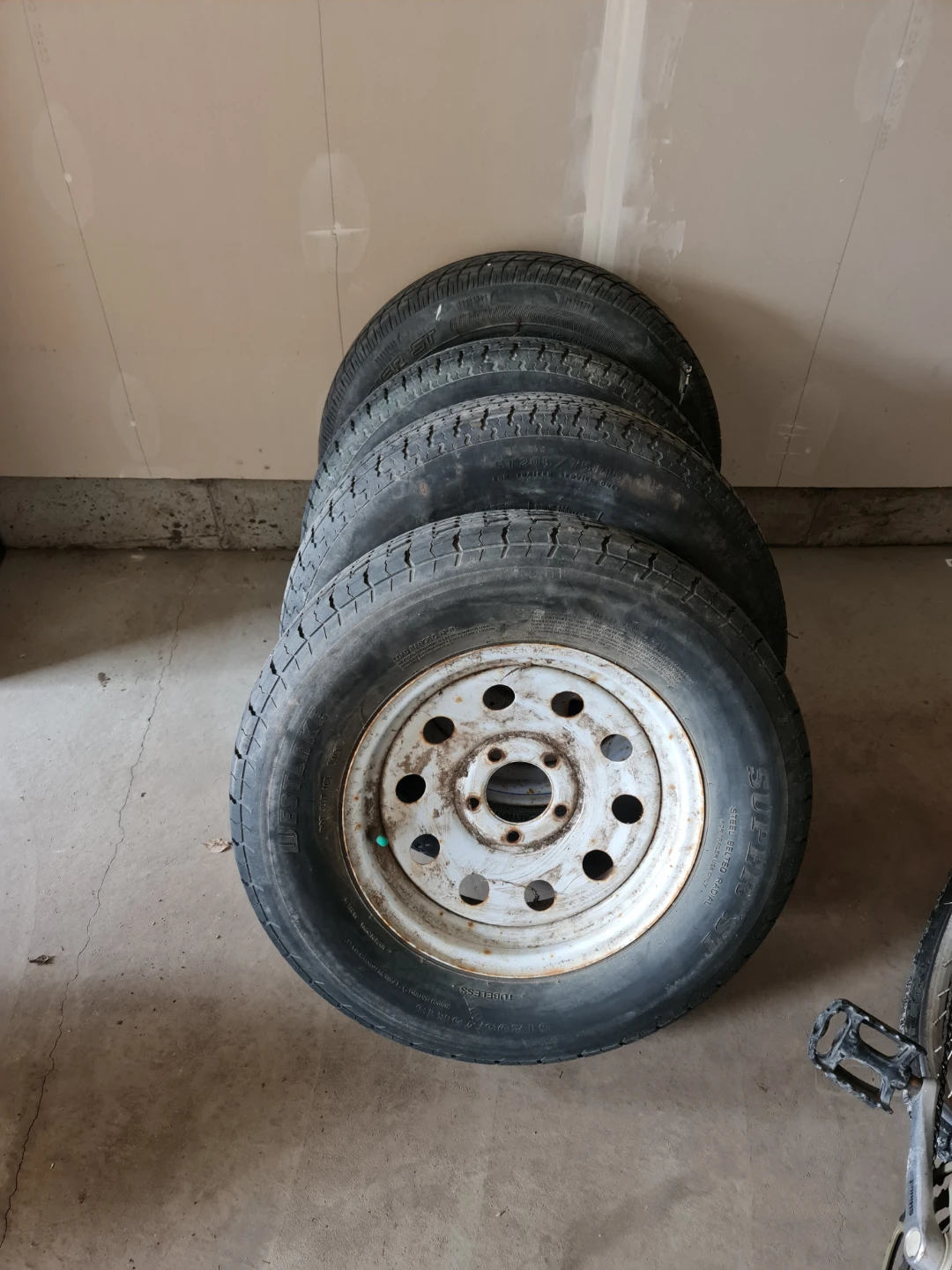 Set of 4 Trailer Tires with Rims 205/75/R15 plus 2 more tires.