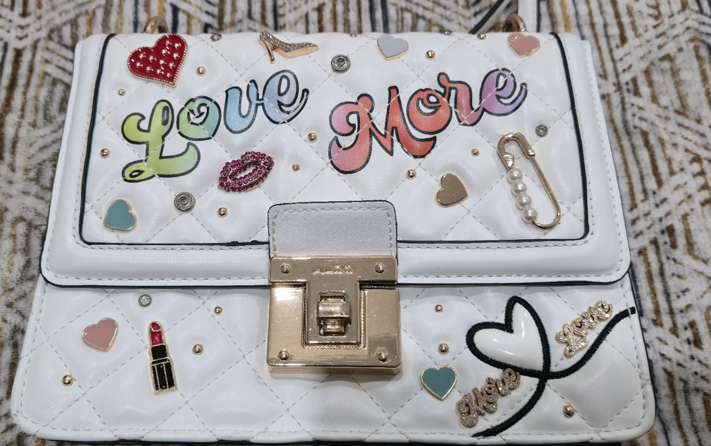 ALDO White Quilted Handbag with "Love More" & Charms