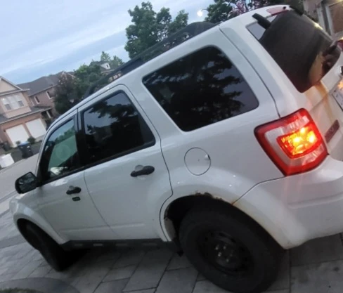 White Ford Escape SUV