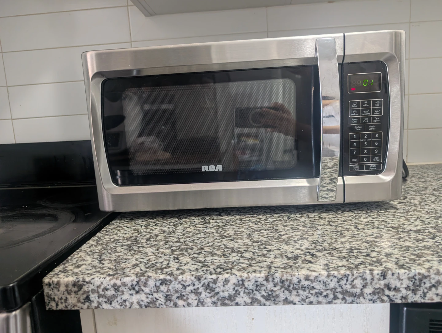 RCA Stainless Steel Microwave - photo 2