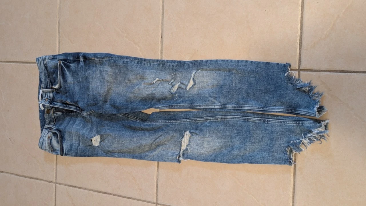 Zara Distressed Mid-Wash Jeans with Raw Frayed Hem