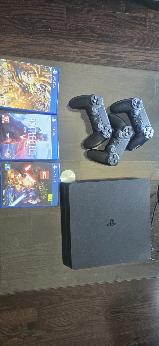 PlayStation 4 Slim Console with 3 Games and 3 Controllers