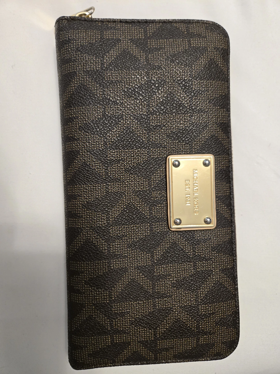 Michael Kors brown monogram zip around wallet