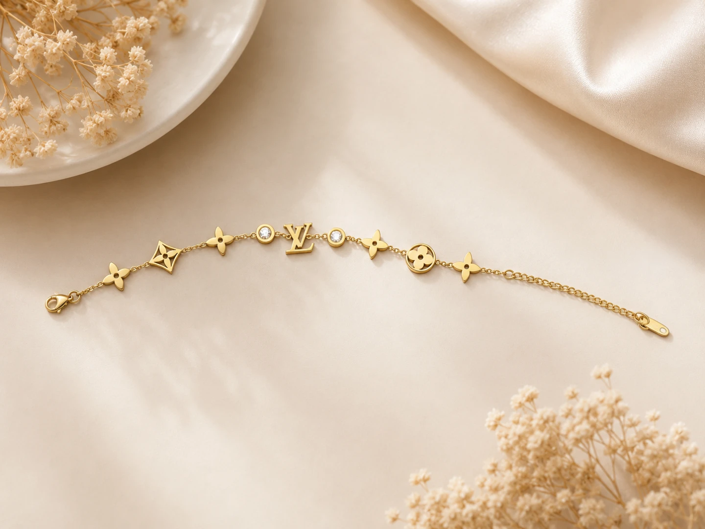 Gold Tone Bracelet with Monogram Charms
