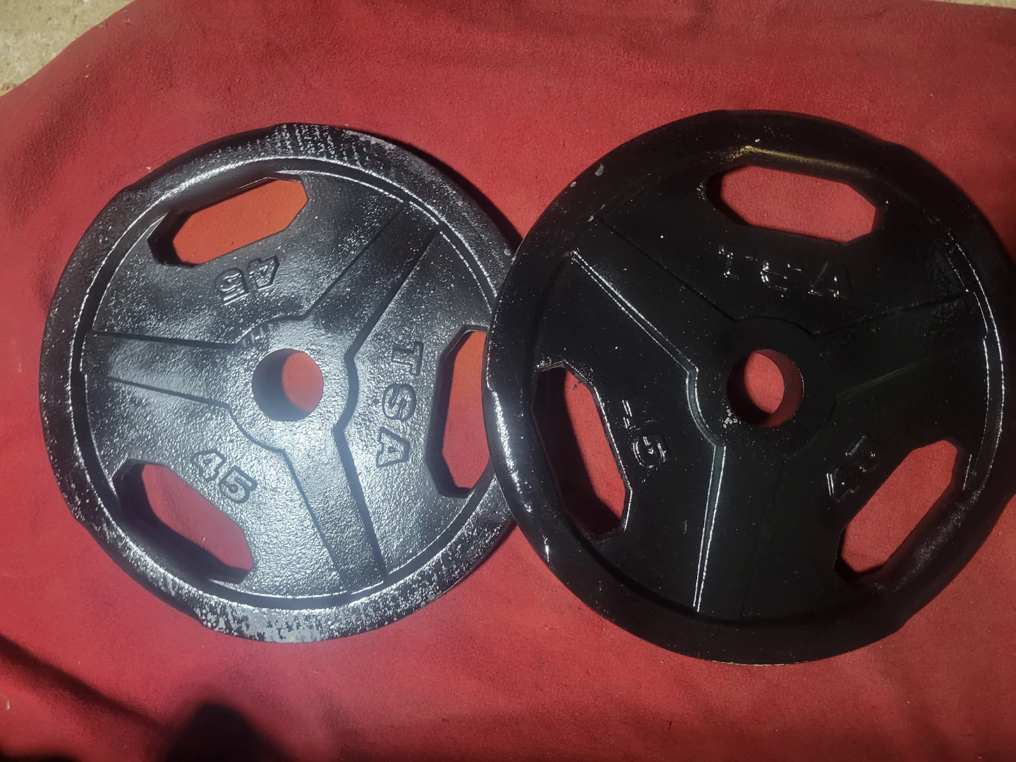 OLYMPIC.  2" HOLE  45LB PLATES TOTAL 90lbs  2-45s